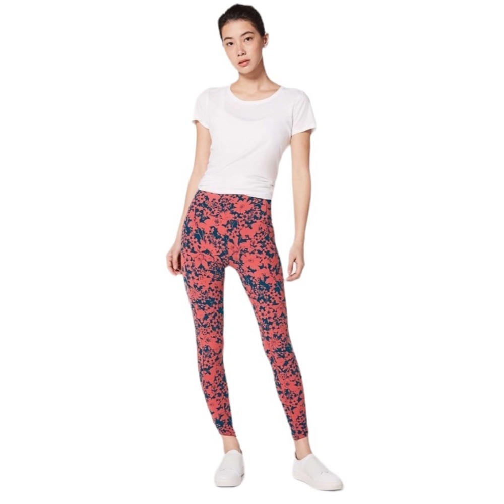 Lululemon All you do tight. 25”, coral and navy leggings.  Size 4